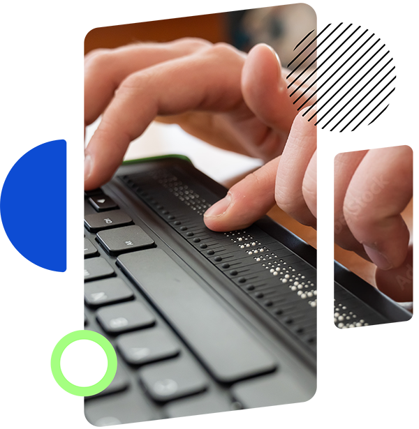 Close-up of hands using a black Braille keyboard.