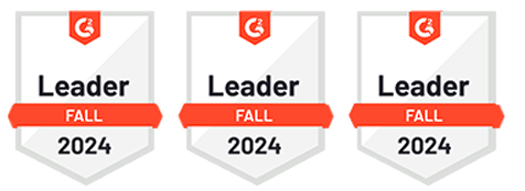 Three award badges, each shaped like a shield with the "G2" logo at the top, and a red banner across the middle stating "Leader Fall 2024".